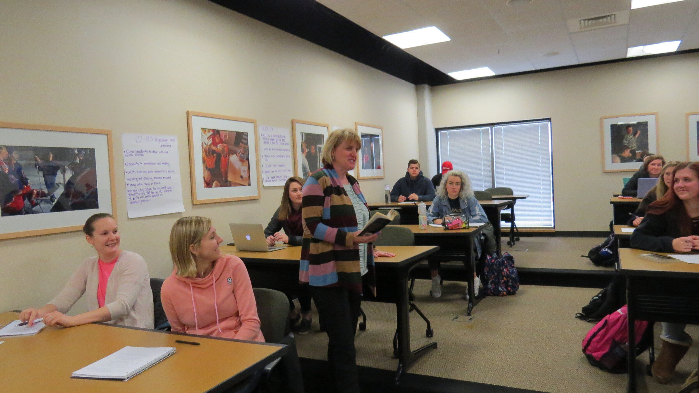 Sister Cyndi Nienhaus teaches a class at Marian University, 2018.