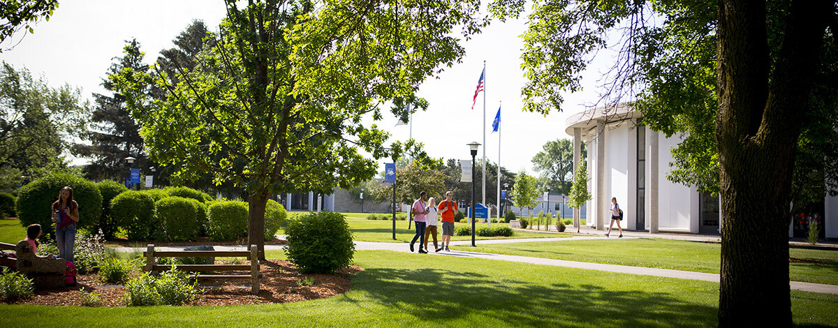 Students walking on Marian University campus. Read about Marian's academic resources.