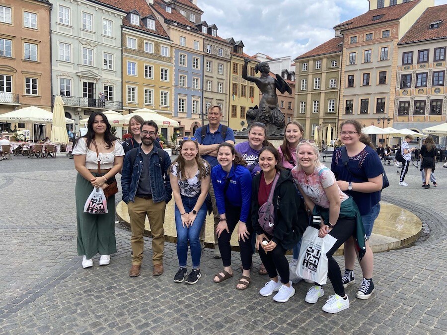Marian University of Wisconsin students pose for a photo with their instructors Dr. Szromba and Dr. Leichter on a field trip to Poland